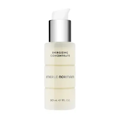 Merle Norman Energizing Concentrate bottle sitting on a white background.