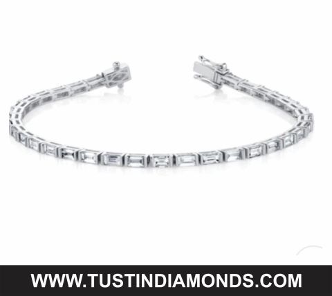 6.00 CARAT NATURAL BAGUETTE CUT LADIES DIAMOND TENNIS BRACELET.
