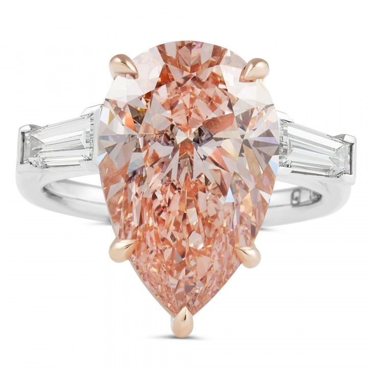 6.71 carat Fancy Vivid Pink Pear Lab Diamond Three-Stone Ring