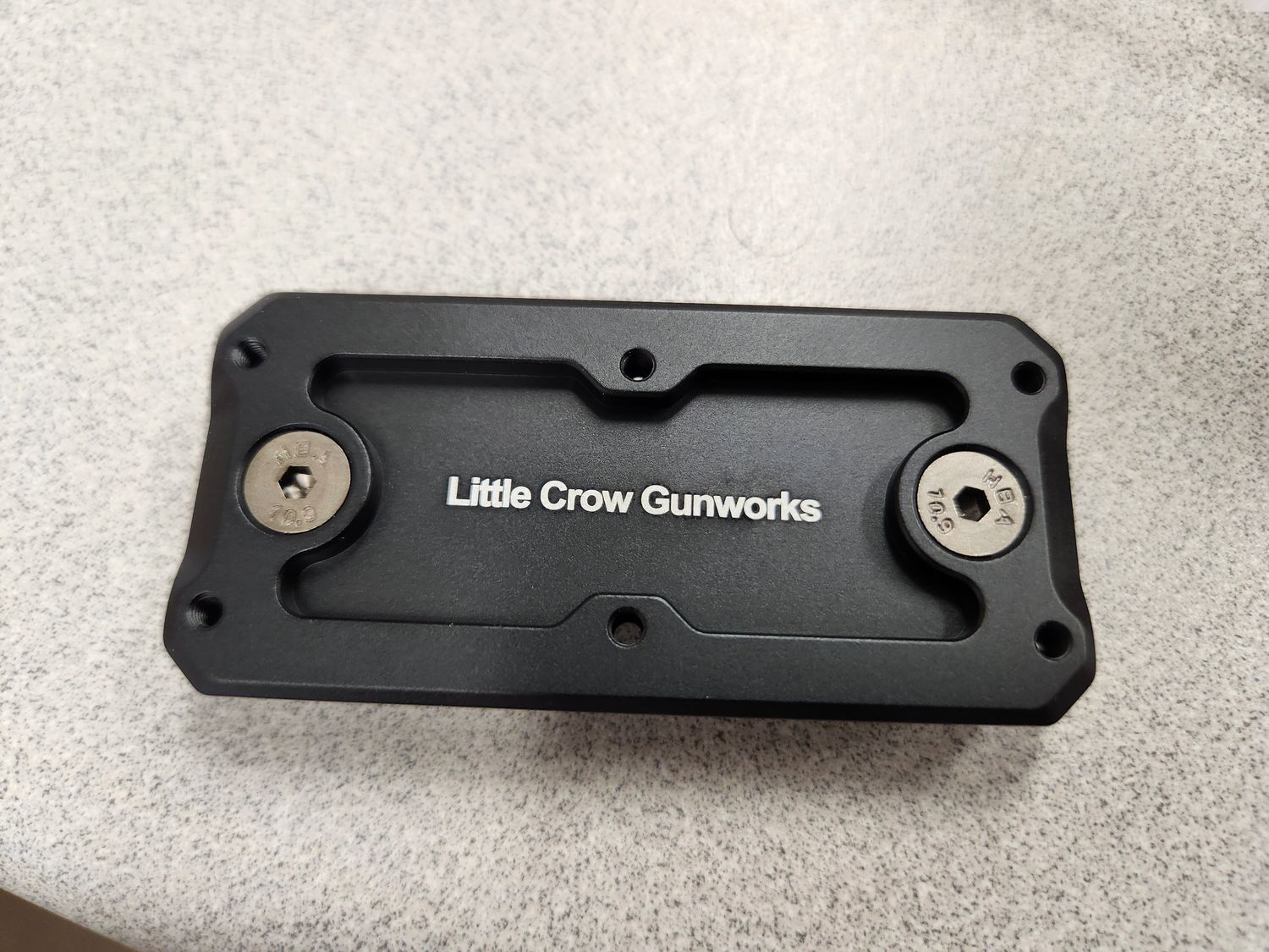 One Little Crow Gunworks 3-inch ARCA plate; two are included in the bundle