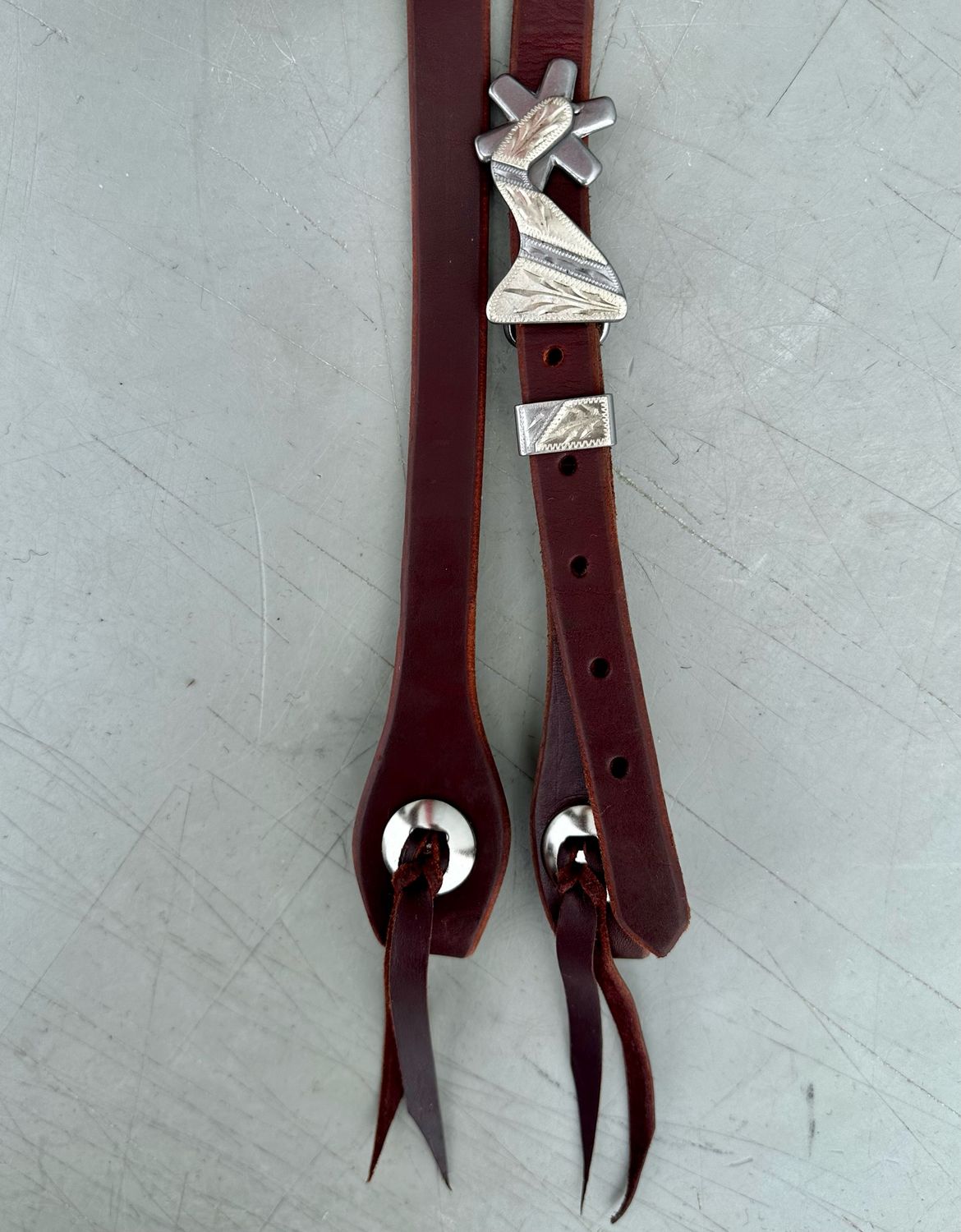 Single Slide Ear Headstall with Fancy Single Spur Shank with Rowel SS Buckle with German Silver Trim 2 3/8” Buckle Length and Keeper Hot-Oiled 3/4” Width