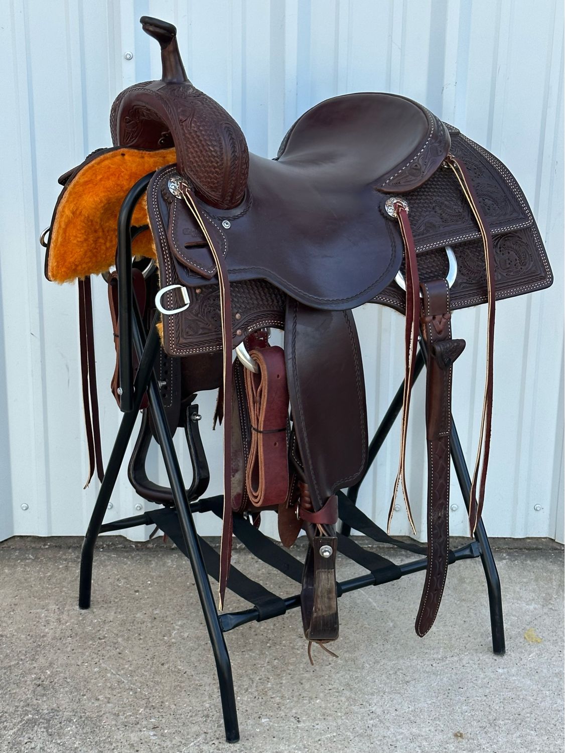 Robert Teskey Elite Cutting Horse Saddle in Dark Oil Finish with a 15- inch Slick Out Seat