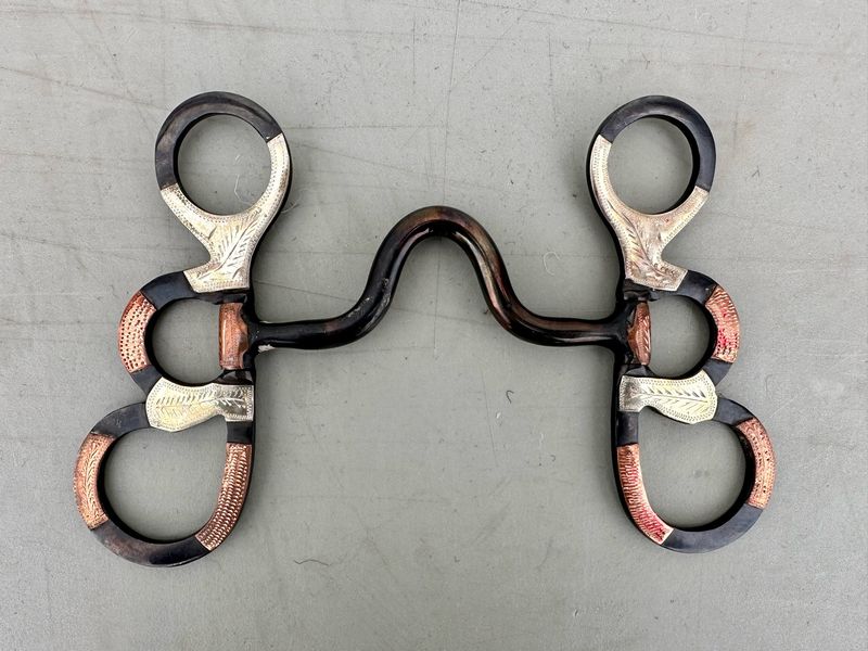 Port Western Bit Antiqued Polished Dark Grey 5” Length 1 1/2” Hight A Port Solid Mouth Piece on 6 3/4” Length Hinged Shanks with Engraved German Silver and Copper Trim