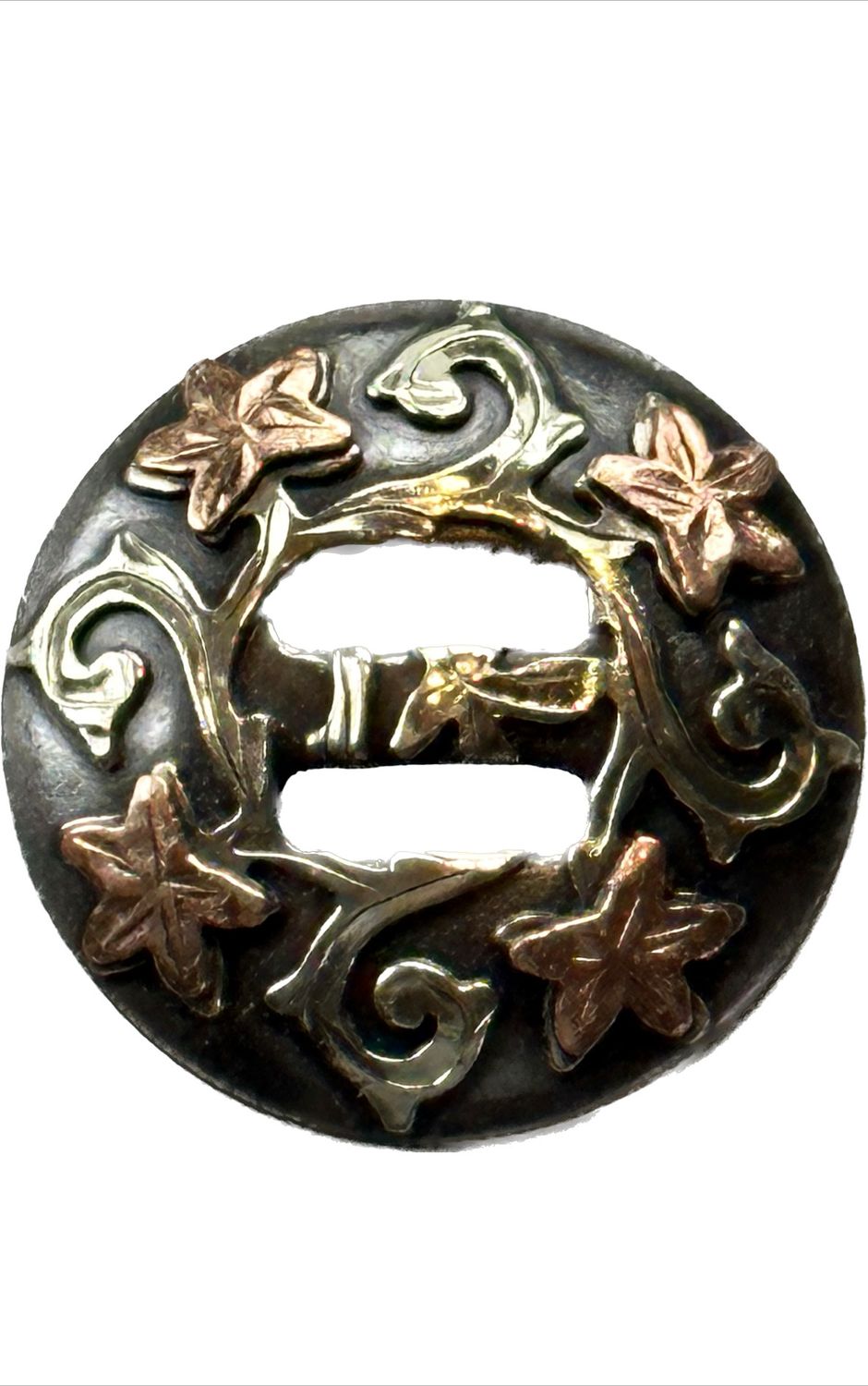 Slotted Concho in Gun Metal Grey with German Silver Trim Scroll Vine with four Copper Flowers