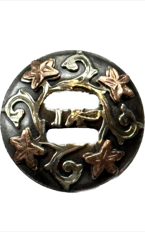 Slotted Concho in Gun Metal Grey with German Silver Trim Scroll Vine with four Copper Flowers