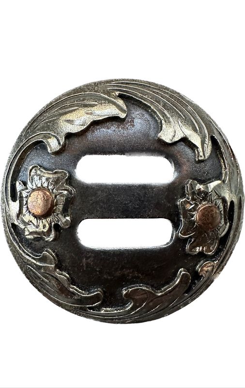 Slotted Concho in Gun Metal Grey with German Silver Trim Closed Wreath Circle with Two Copper Dot Blossoms 012425