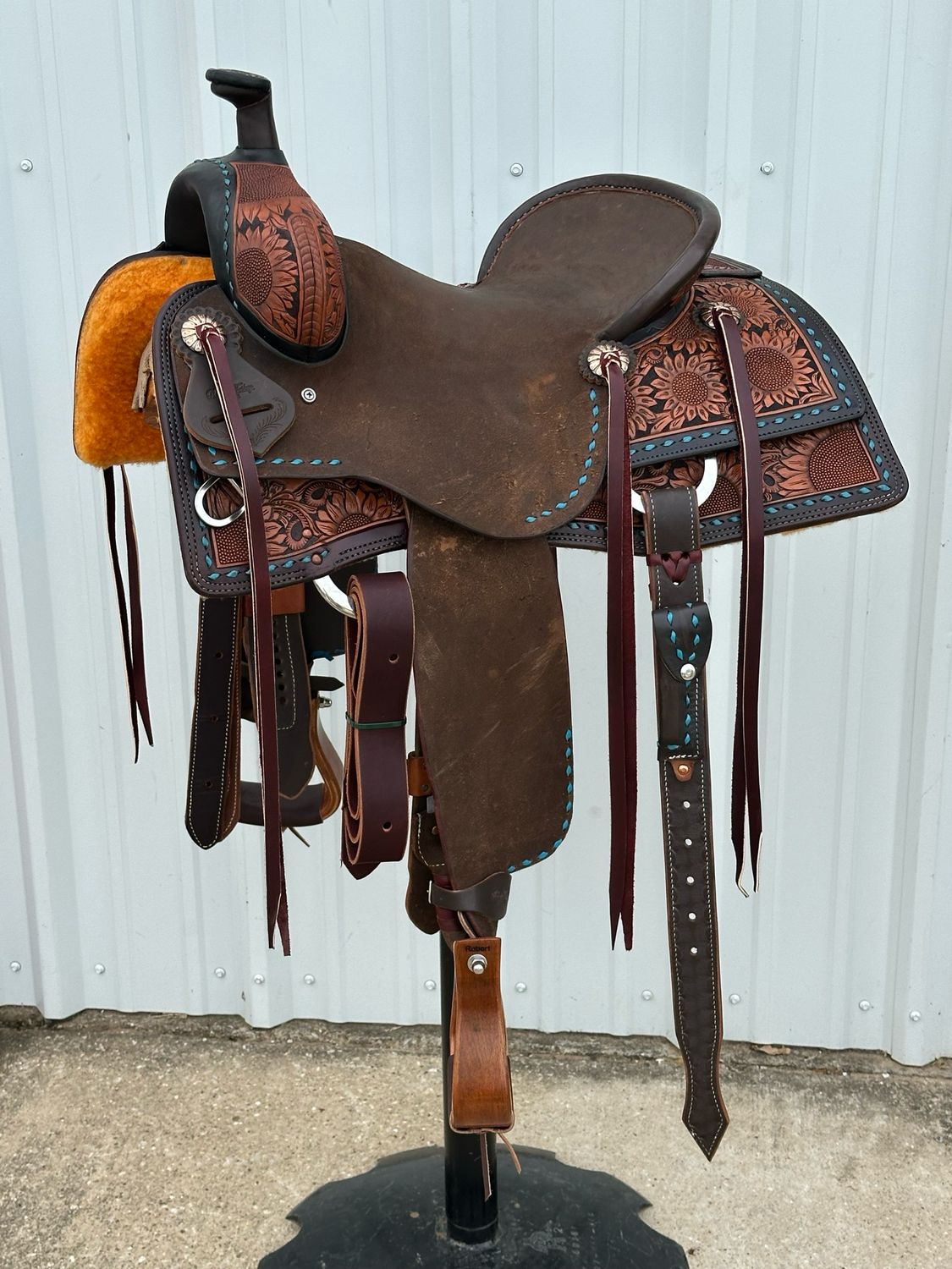 Robert Teskey Elite Cow Horse Saddle with a 15 1/4-inch Rough Out Seat Sunflower Tooled with Turquoise Buck Stitch Border
