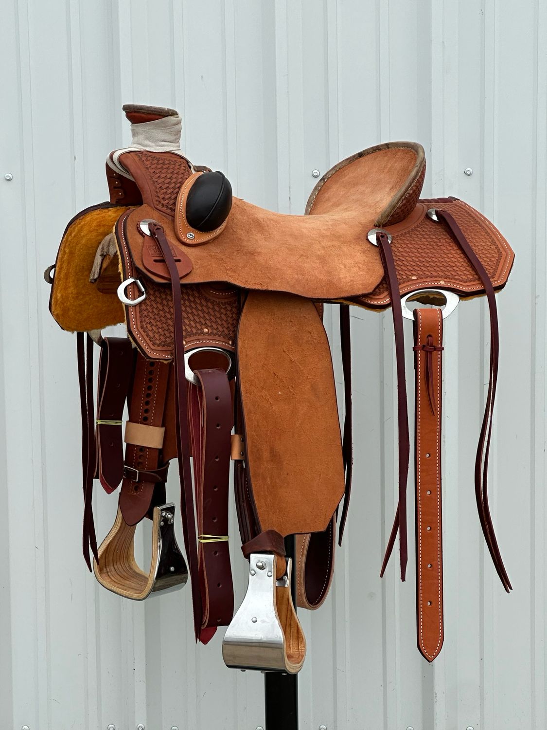 Robert Teskey Cliff Wade Ranch Roping Saddle with a 16 1/2- inch Rough Out Seat Basket Weave Tooled with Bucking Rolls