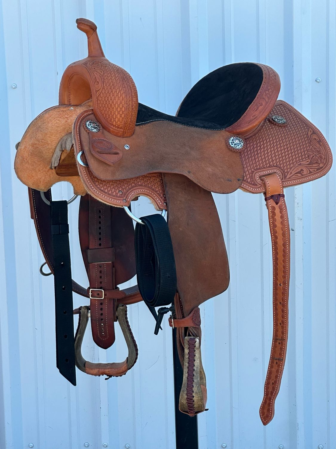 SRS Pilot Point, Tx  Barrel Horse Saddle with a 15- inch Black Suede Padded Seat Basket Weave and Floral Tooled Medium Chestnut  Finish