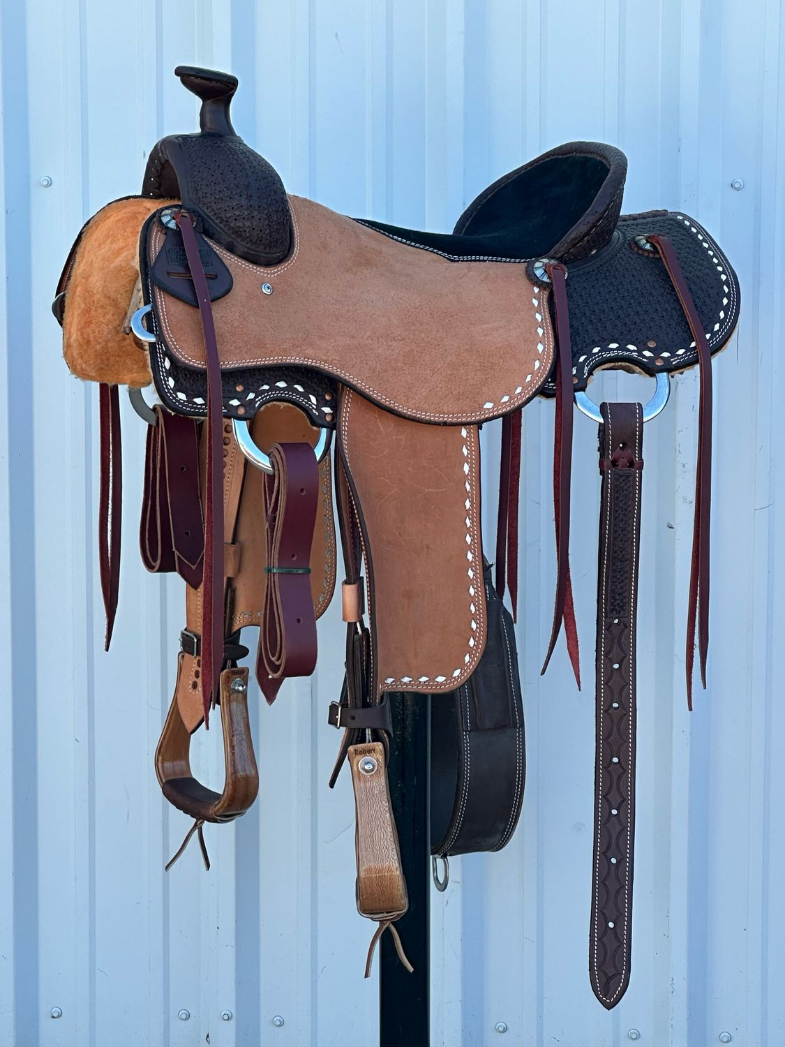 Robert Teskey Ranch Roping Saddle with a 16- inch Bicycle Seat Tooled Floral with White Buck Stitch Border