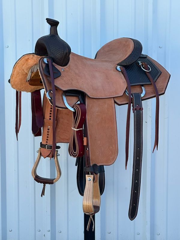 Robert Teskey Ranch Roping Saddle with a 15- inch Rough Out Seat Tooled Arrow Head Weave Dark Finish