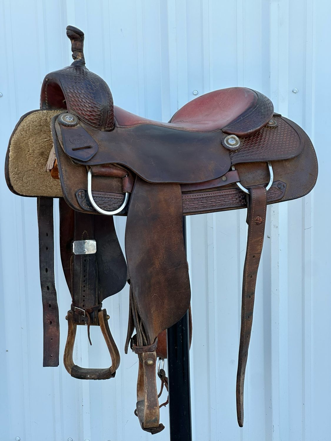 Foster Denton, Tx Cutting Horse Saddle with a 16 1/2- inch Padded Seat Basket Weave Tooled