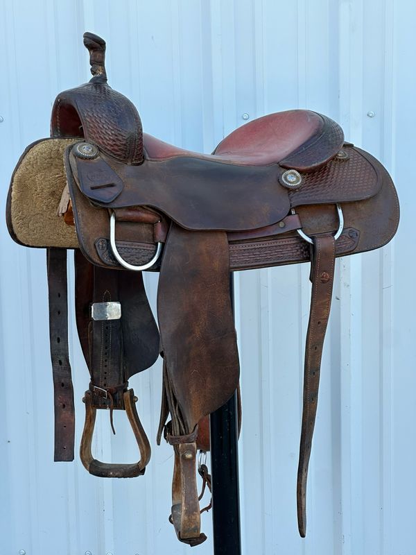 Foster Denton, Tx Cutting Horse Saddle with a 16 1/2- inch Padded Seat Basket Weave Tooled