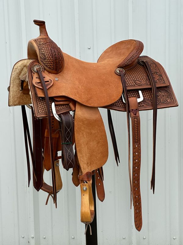 Robert Teskey Elite Cow Horse Saddle with a 16- inch Rough Out Seat Tooled Basket Weave with Star and Floral Medium Finish