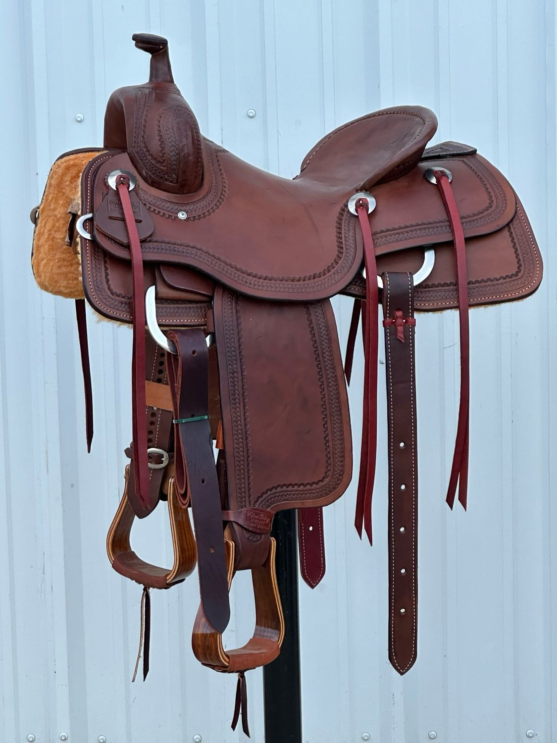 Robert Teskey Ranch Cutting Horse Saddle with a 15- inch Slick Out Seat Tooled with Border Dark Finish