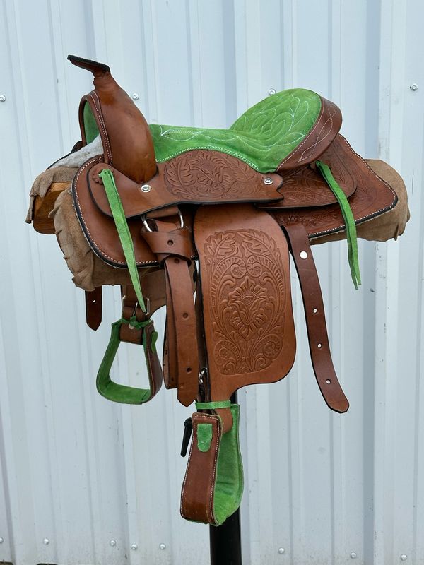 Pony Saddle with a 12- inch Green Stitched Padded Seat Tooled Foliage