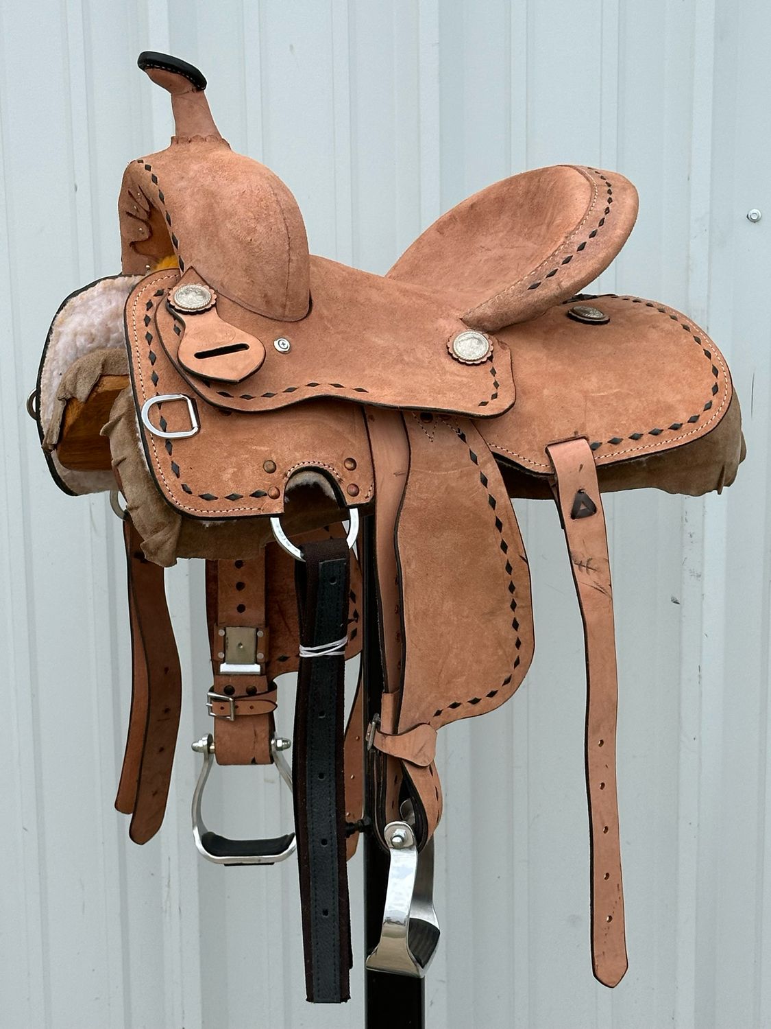 Chisom Trail Kid’s Saddle with a 11 1/2-inch Rough Out Seat Buck Stitch Border Light Finish