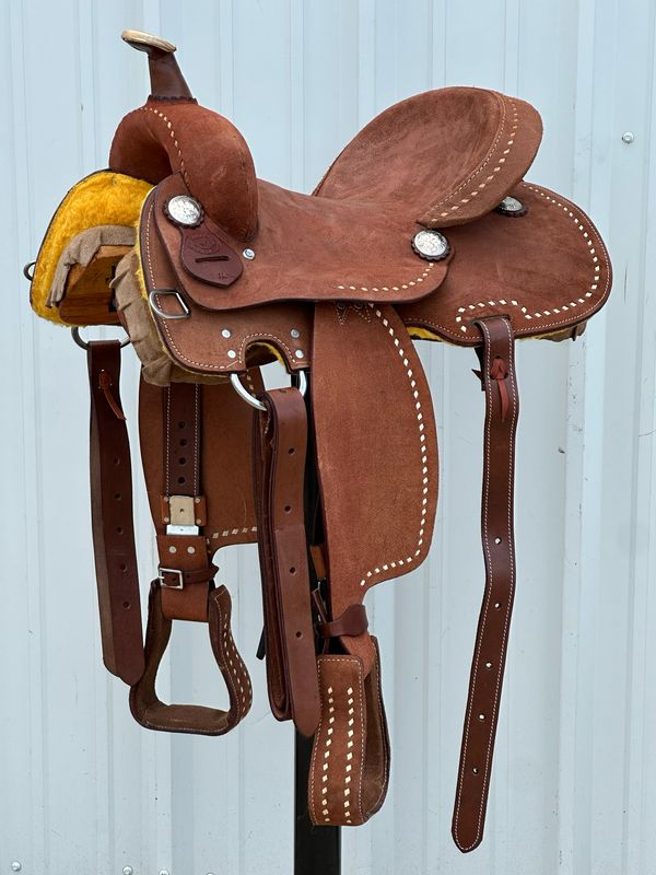 Coral Creek All-around Youth Saddle with a 14- inch Rough Out Seat with Buck Stitch Border Medium Finish