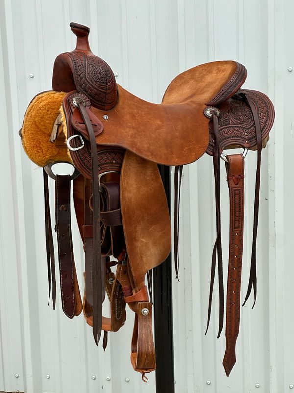 Stuart Rybak Cow Horse Saddle with a 16 1/2- inch Rough Out Seat Tooled Floral with Interlace Border Medium Finish