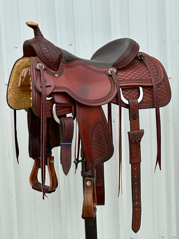 Vernon Purdy Saddle with a 15 3/4- inch Black Padded Seat Tooled cloud Interlace with Border Chestnut Finish