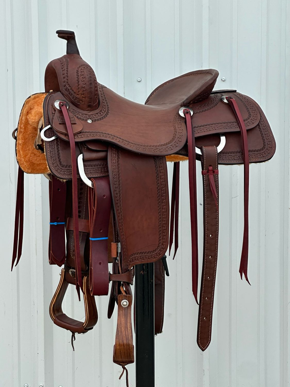Robert Teskey Cow Horse Saddle with a 15 1/2- inch Slick Out Seat Tooled with Double Border Medium Dark Finish