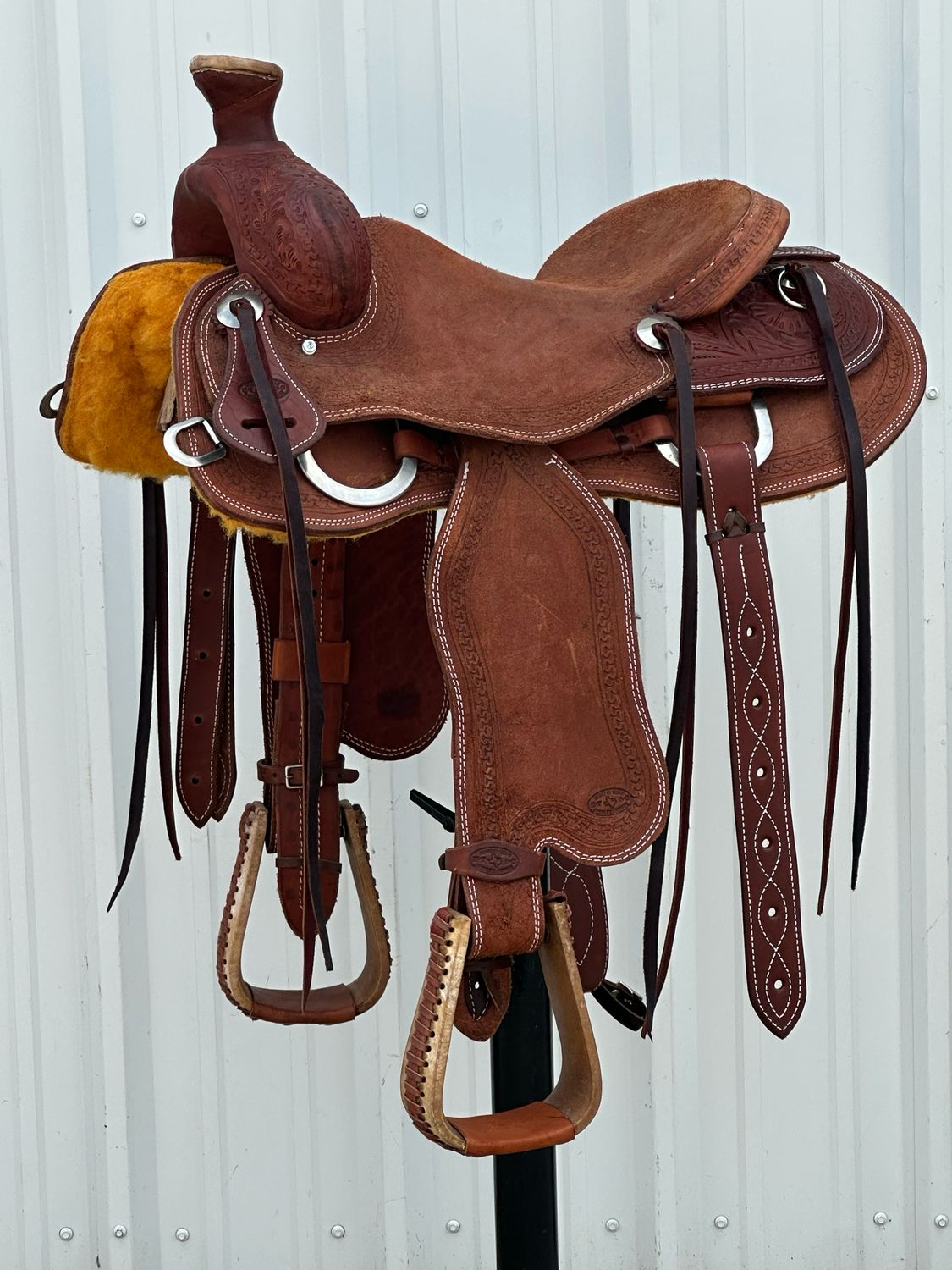 Heart O Texas Ranch Roping Saddle with a 16- inch Rough Out Seat Tooled Floral with Snake Border Keetch Horn Medium Finish