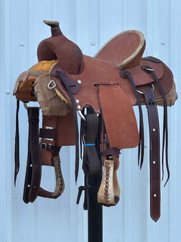 Heart O Texas Kid’s Buckaroo Saddle with a 12- inch Rough Out Seat Dark Finish