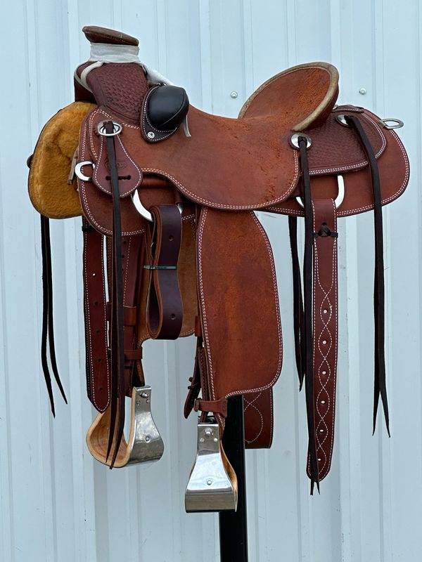 Heart O Texas Cliff Wade Mule Saddle with a 15 1/2- inch Rough Out Seat Tooled Basket Weave Mule Bars Bucking Rolls