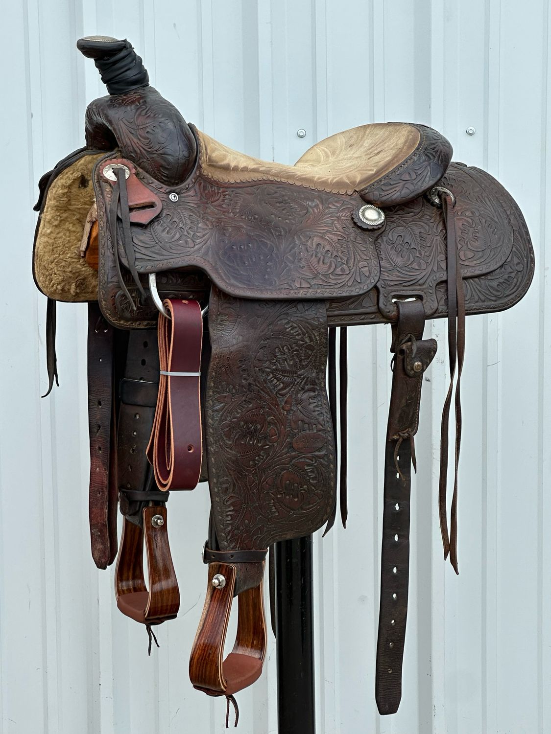 Ryon Fort Worth Roping Saddle with a 15- inch Beige Rough Out Seat Tooled Oak Leave New Stirrups and Latigo Leathers