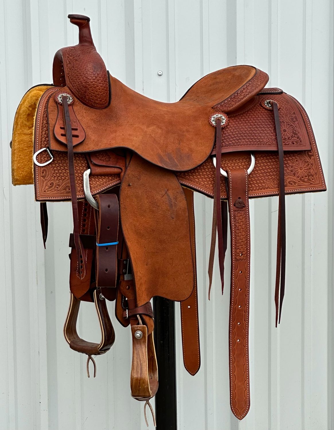 Robert Teskey Elite Ranch Cutting Saddle with a 16- inch Rough Out Seat Tooled Basket Weave with Floral Accent  Medium Finish