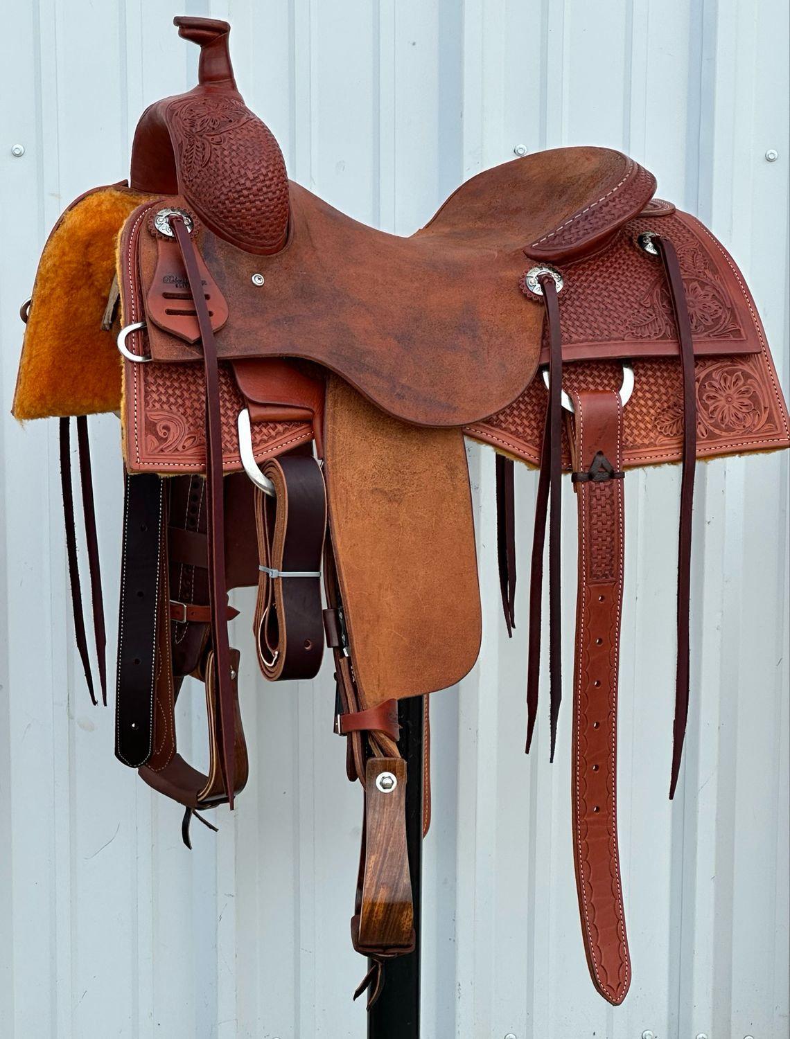 Robert Teskey Elite Ranch Cutting Saddle with a 15 3/4- inch Rough Out Seat Tooled Basket Weave with Floral Accent Medium Dark Finish