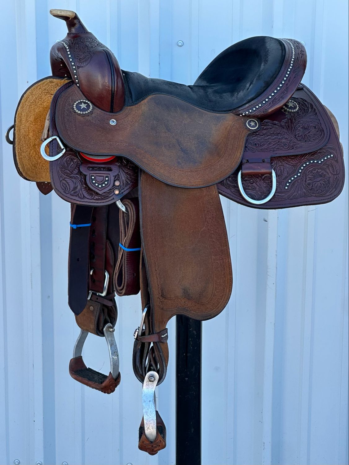 Bar J Saddlery Stacy Westfall Signature Series Mounted Shooting Saddle with a 14 1/4- inch Black Suede Padded Seat Tooled Floral with Hourglass Border and Stainless Dots