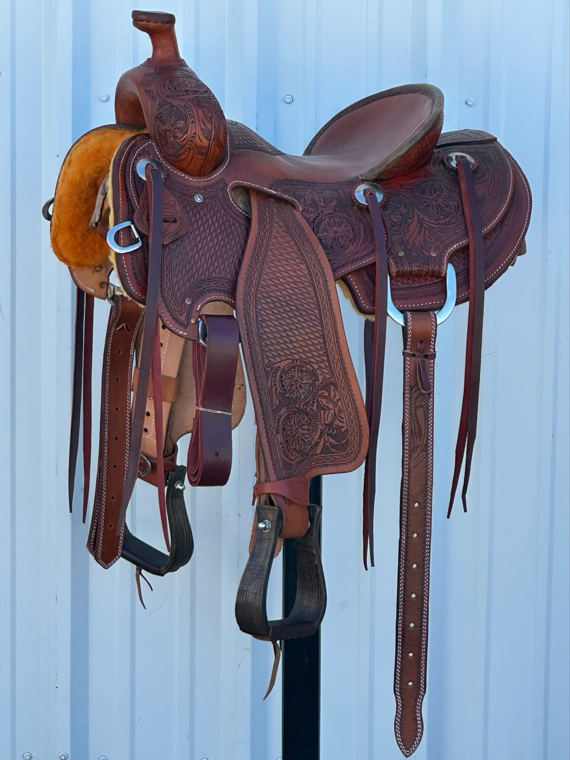 Robert Teskey Strip Down Seat Rig Ranch Roping Saddle with a 14 1/2- inch Slick Out Seat Tooled Floral and Basket Weave with Aztec Border Medium Finish