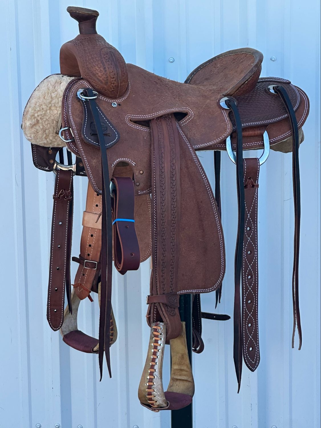 Heart O Texas Strip Down Seat Rig Ranch Roping Saddle with a 15 1/2- inch Rough Out Seat Tooled Basket Weave with Snake Border Double Stitch Dark Finish