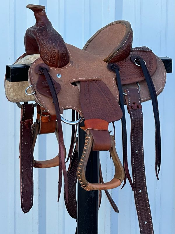 Heart O Texas Kid’s Buckaroo Saddle with a 10- inch Tough Out Seat Tooled Basket Weave with Snake Border Dark Finish