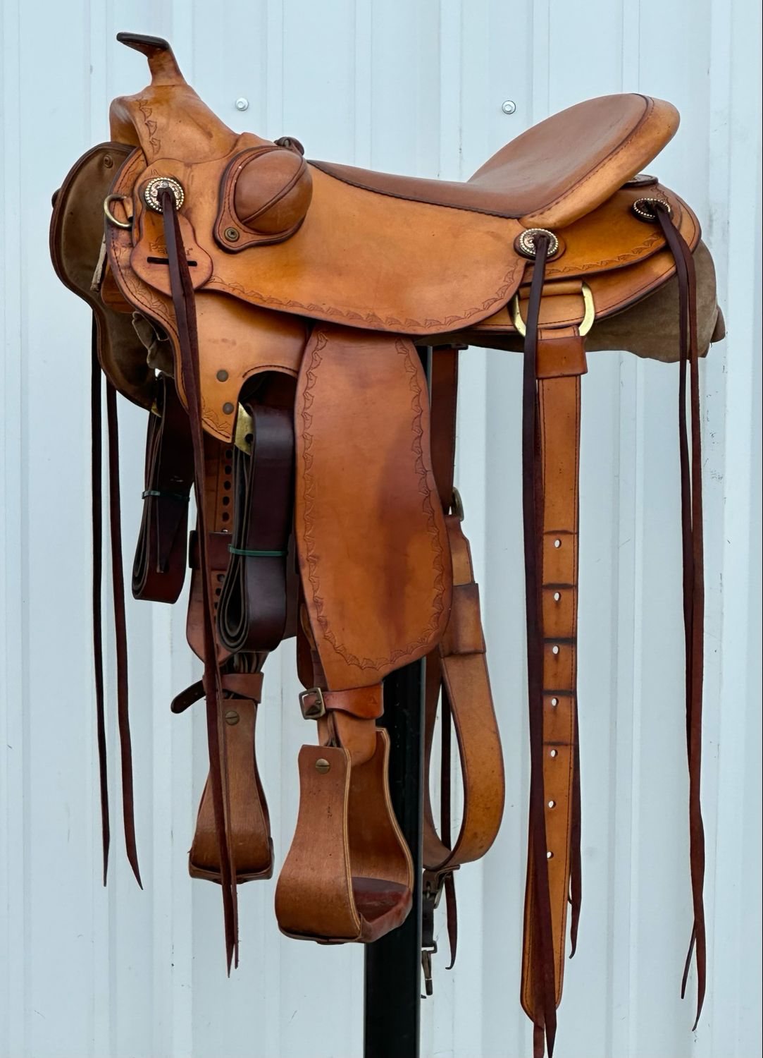 Pullman Saddle Co. Pat Parelli Natural Performer Saddle with a 17- inch Slick Out Seat Tooled with Parelli Logo Border Bucking Rolls Medium Finish