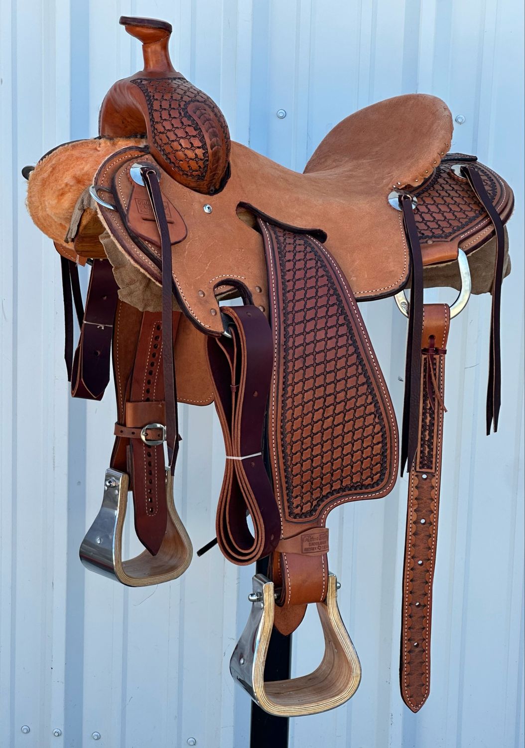 Robert Teskey Strip Down Seat Rig Ranch Roping Saddle with a 14 1/2- inch Rough Out Seat Tooled Cloud Interlace with Stenciled Border Medium Finish