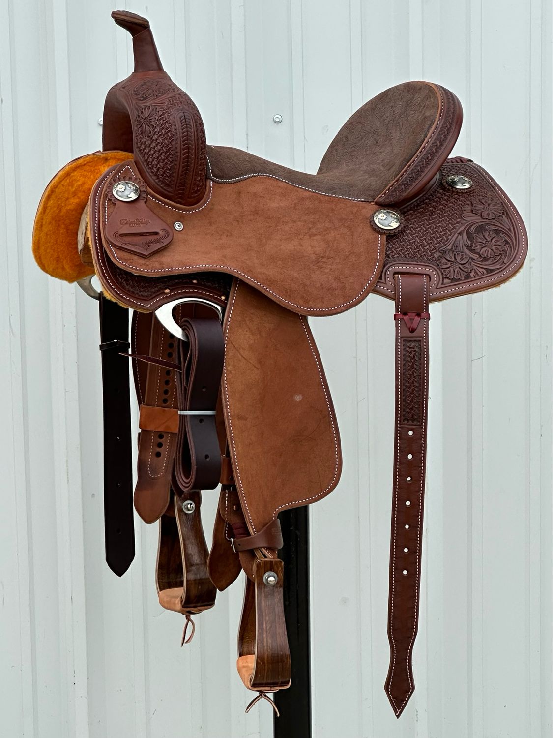 Robert Teskey Elite Barrel Racing Saddle with a 15- inch Padded Brown Floral Embossed Suede Seat Tooled Hourglass Interlace with Floral Accent Medium Dark Finish