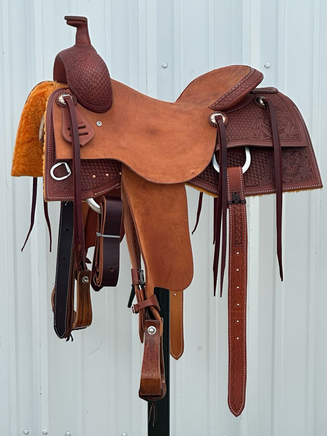 Robert Teskey Elite Cow Horse Saddle with a 15 1/4- inch Tough Out Seat Tooled Basket Weave with Floral Accent Medium Finish