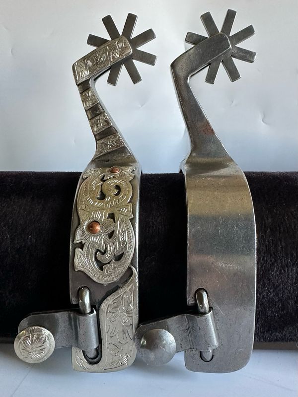 Men’s Western Spurs on a 1- inch Width Polished Steel Band with German Silver Trim and Bars on 2 3/4- inch Length 90 Degree Angled Shanks with 8 Point Rowels 060926
