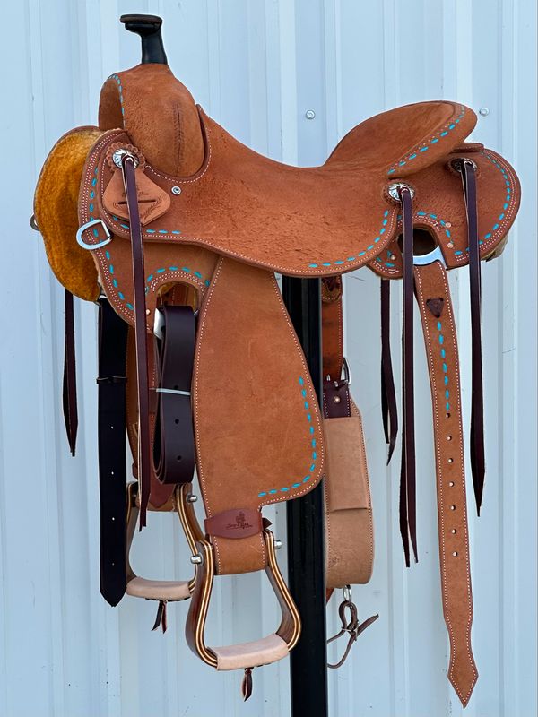 Stuart Rybak Cow Horse Saddle with a 16 3/4- inch Rough Out Seat Turquoise Buck Stitch Light Medium Finish
