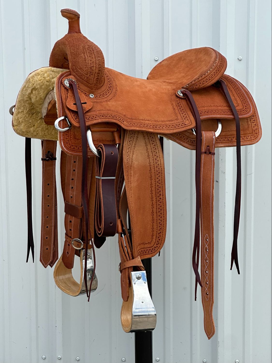 Robert Teskey Ranch Roping Saddle with a 16 1/4- inch Rough Out Seat Tooled with Snake &amp; Barbwire Border Medium Finish