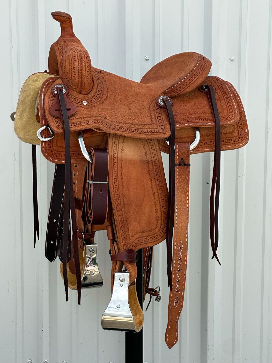 Robert Teskey Ranch Roping Saddle with a 14- inch Rough Out Seat Tooled with Snake &amp; Barbwire Border Medium Finish
