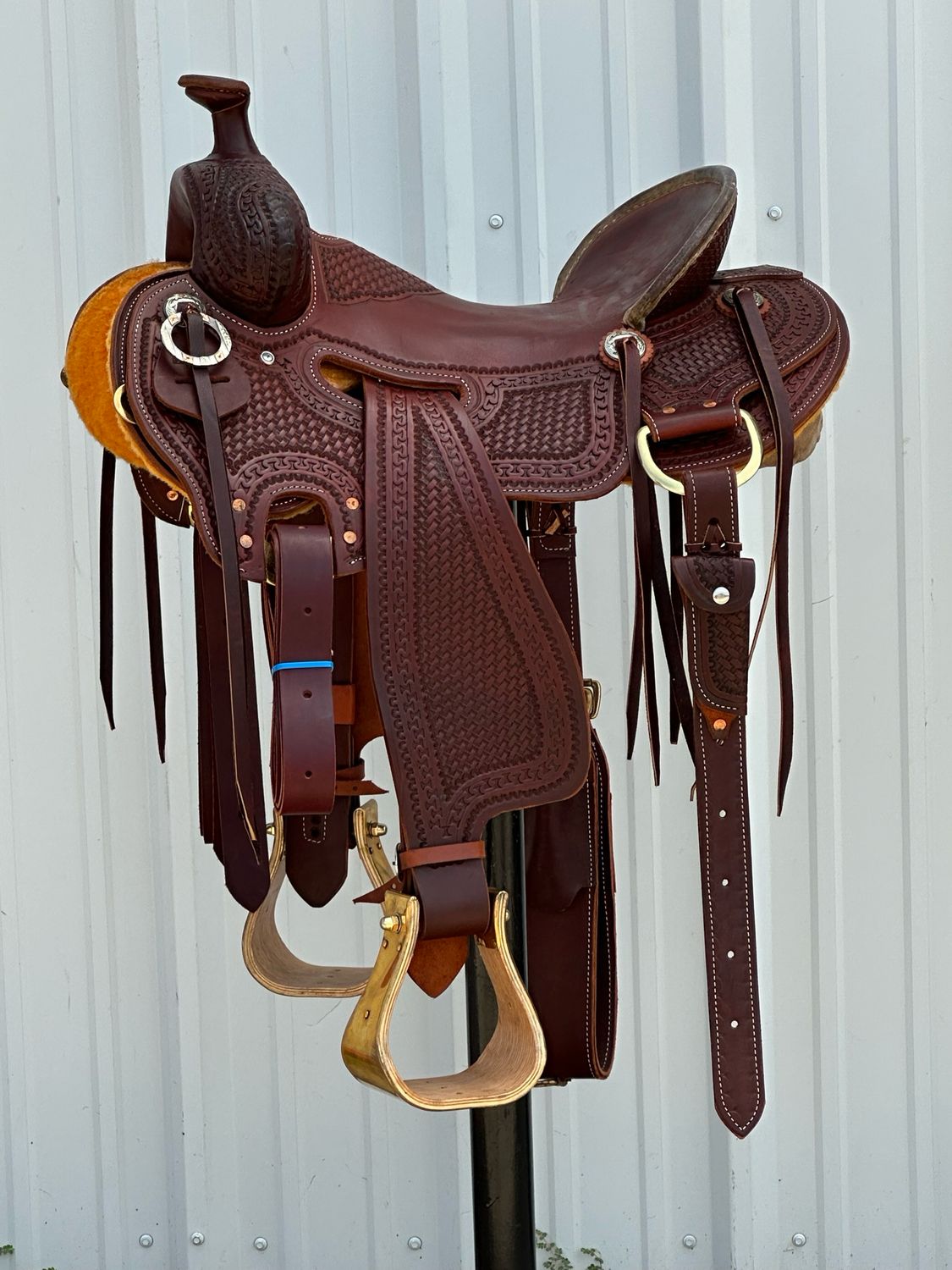Robert Teskey Elite Strip Down Seat Rig Ranch Roping Saddle with a 16- inch Slick Out Seat Tooled Basket Weave with Snake Border and Embossed Floral Border All Brass Hardware Dark Finish