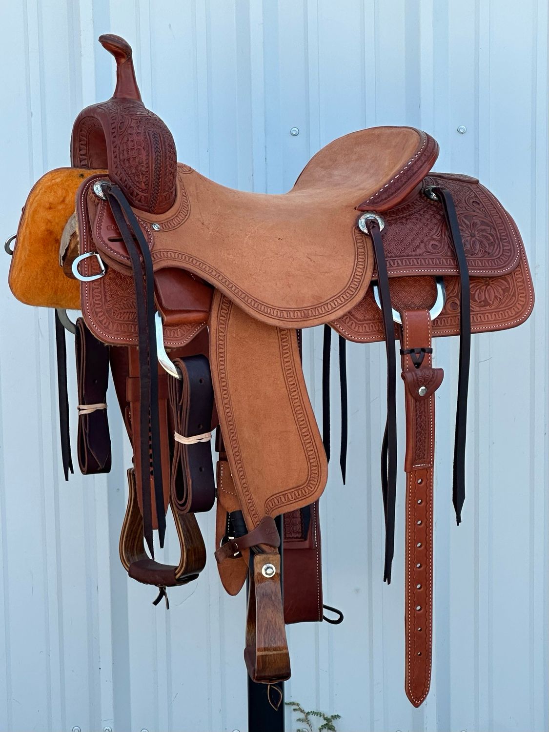 Robert Teskey BW- Tree Cutting Horse Saddle with a 16 3/4- inch Rough Out Seat Tooled Floral with Floral Corner and Snake Border Medium Dark Finish