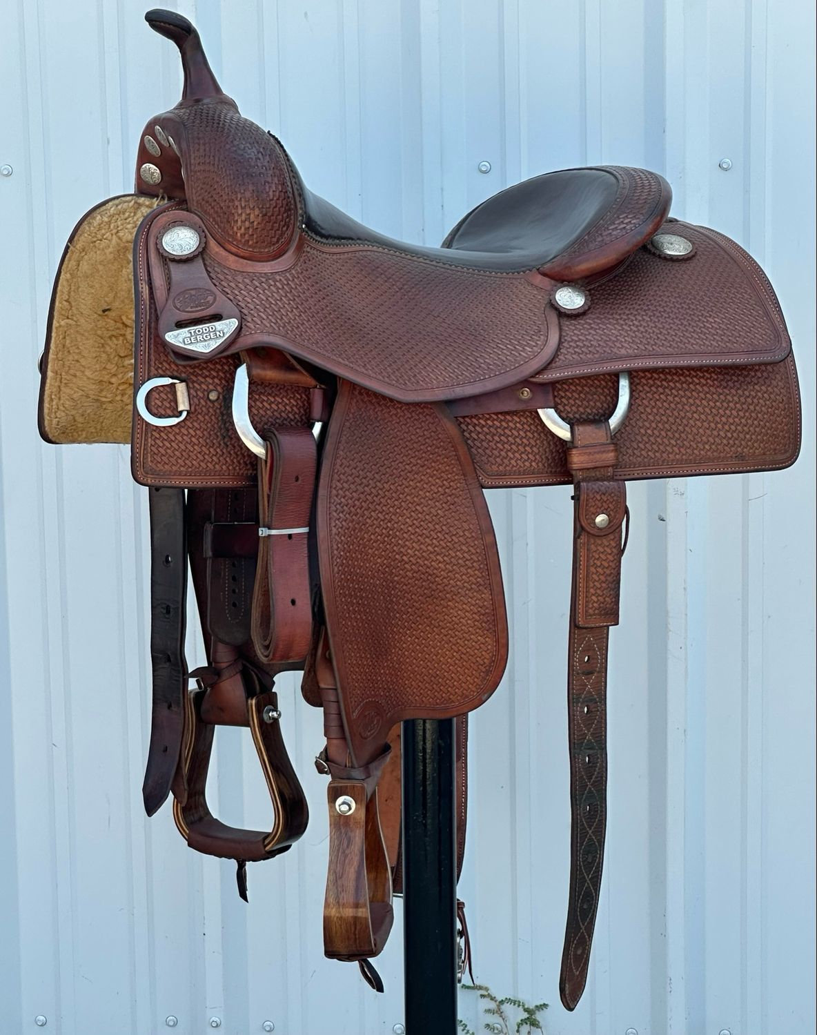 Bob’s Custom Saddles Todd Bergen Reining Saddle with a 16- inch Dark Brown Smooth Padded Seat Sterling Sliver OL Conchos Tooled Basket Weave Medium Dark Finish