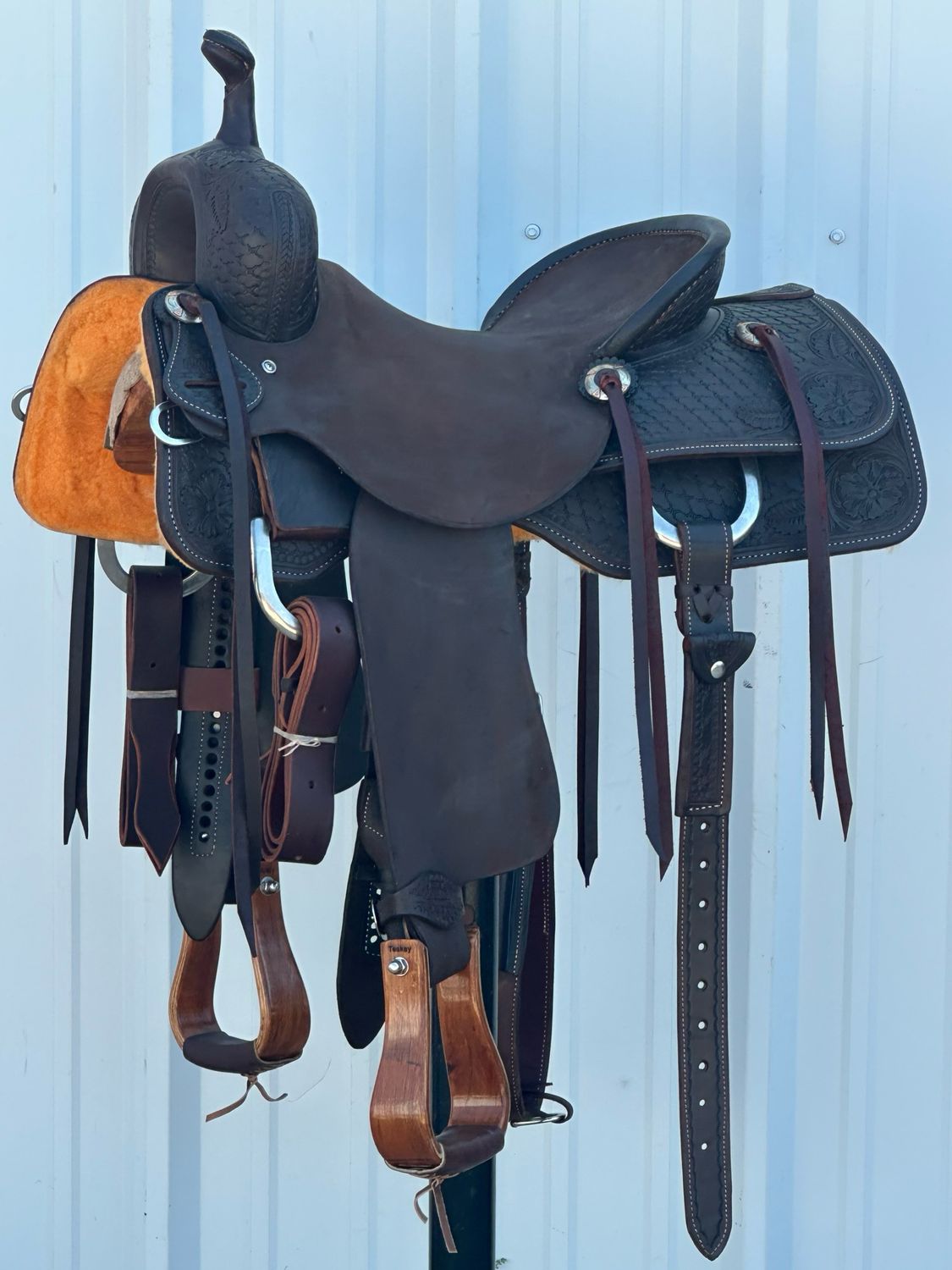 Robert Teskey Elite Cutting Horse Saddle with a 15 1/2- inch Rough Out Seat Tooled Cloud Interlace with Floral Corners Dark Finish