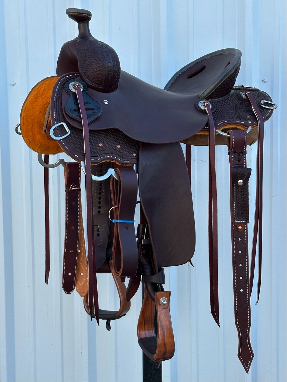 Robert Teskey Elite Mule Saddle with a 15 3/4- inch Slick Out Seat Tooled Basket Weave with Floral Accent Dark Finish