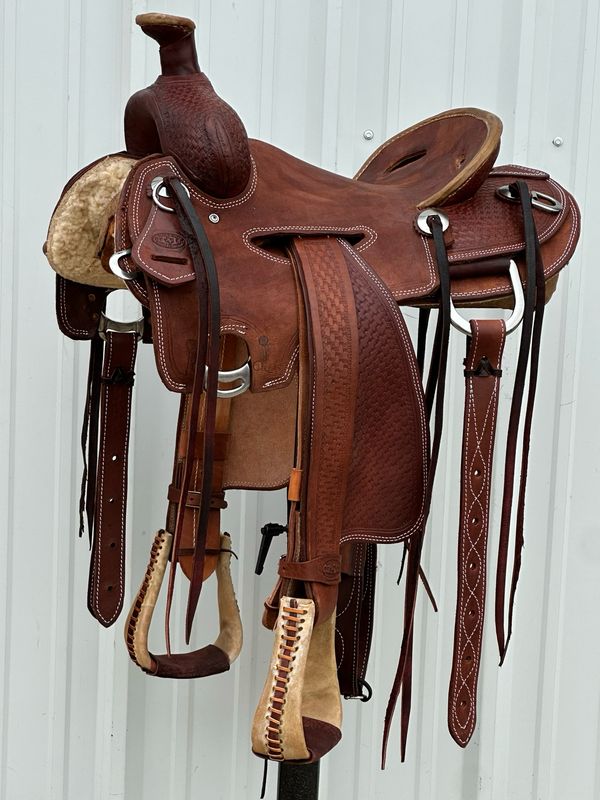 Heart O Texas Mule Saddle with a 15- inch Rough Out Seat Tooled Basket Weave  Double Stitch Medium Dark Finish
