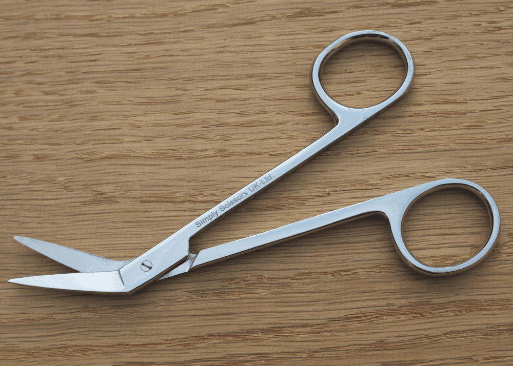 Angled scissors outlet